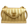 CHANEL 1994-1996 Gold Lambskin Vertical Shoulder Bag