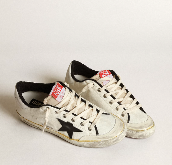 Super-Star LTD in beige canvas with black star "LIMITED"