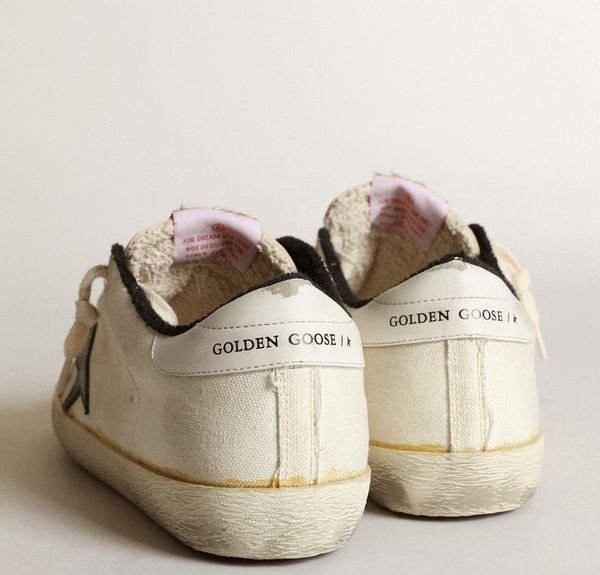 Super-Star LTD in beige canvas with black star "LIMITED"