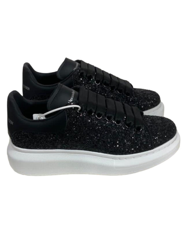 Oversize in nero glam