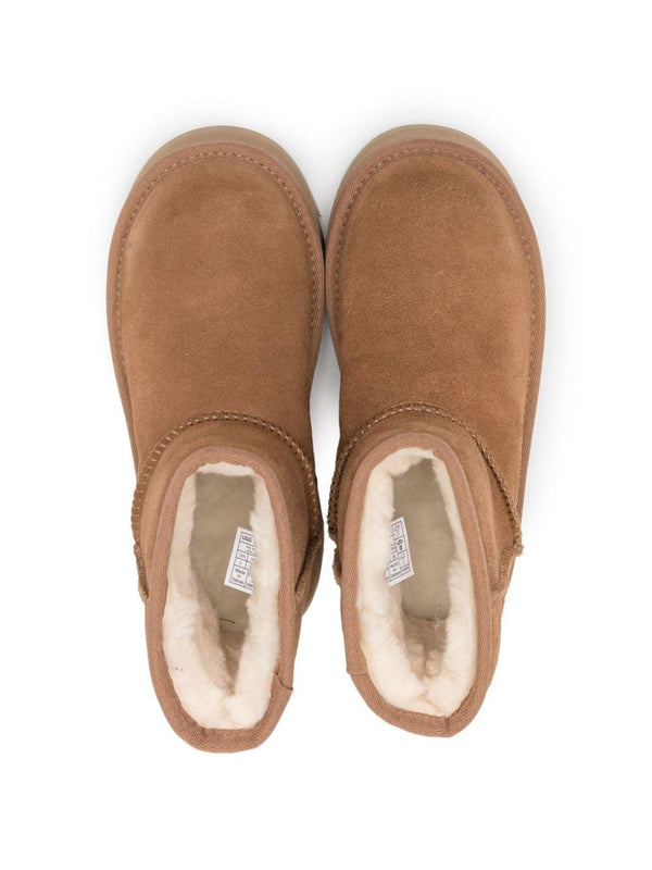Stivali per bambina UGG Kids Classic Mini II beige con suola alta