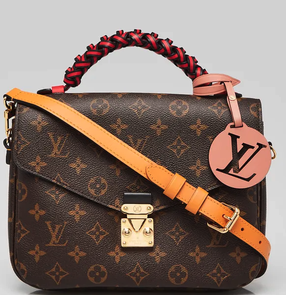 Borsa Pochette Metis in tela Monogram con manico intrecciato