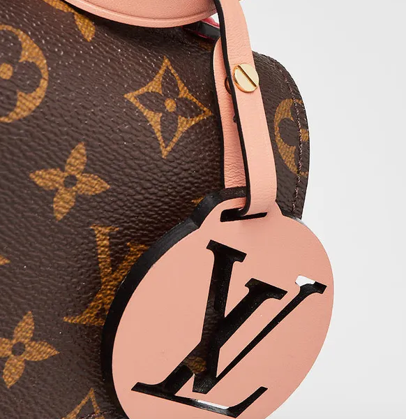 Borsa Pochette Metis in tela Monogram con manico intrecciato