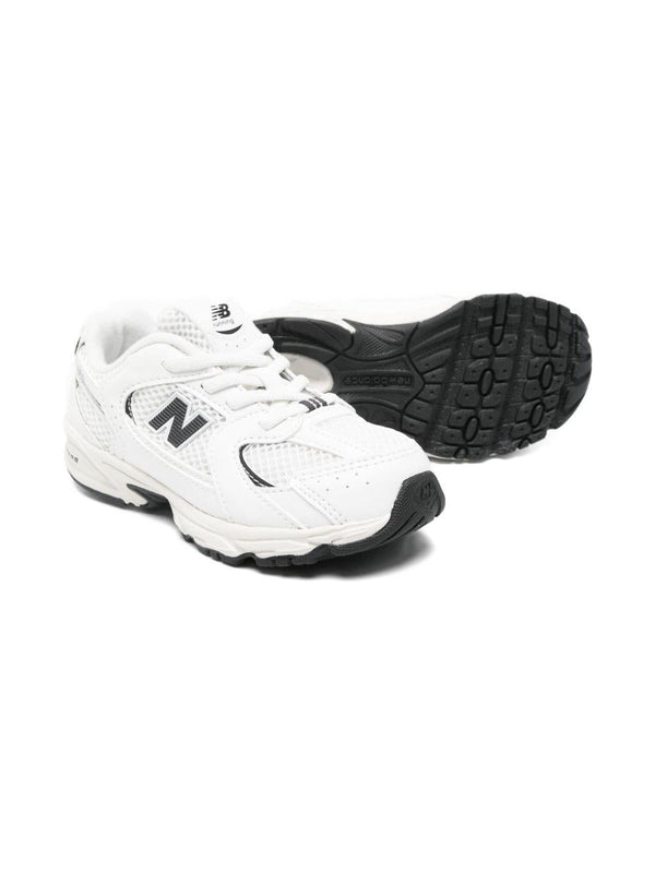 Sneakers 530 per bambino New Balance Kids bianche con pannelli in rete