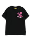 T-shirt per bambina Off-White Kids nera con logo ed effetto vernice spray